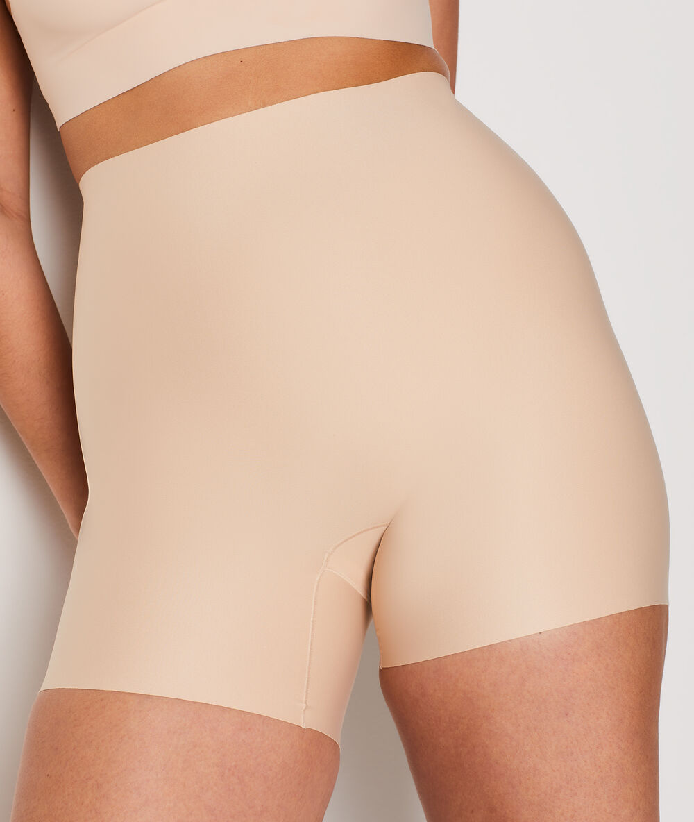 Figurformendes panty – starker halt beige.