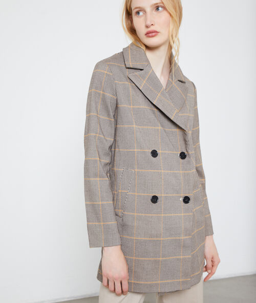 Trench &agrave; carreaux camel.