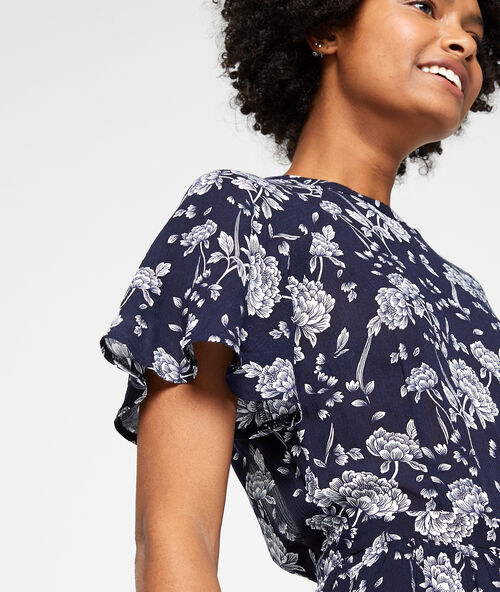 Robe longue dos ouvert à imprimé fleuri marine.