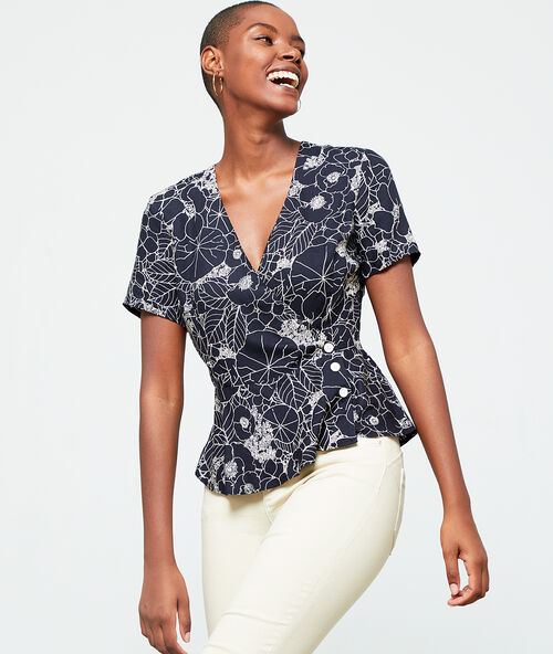 Blouse cache-coeur &agrave; imprim&eacute; fleuri noir.