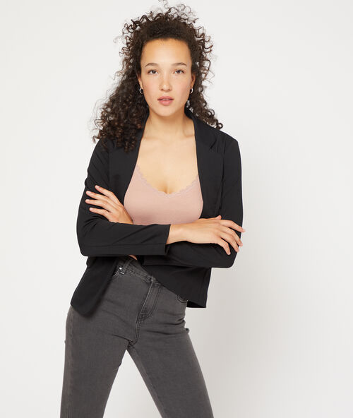 D&eacute;bardeur c&ocirc;tel&eacute; d&eacute;collet&eacute; guipure rose poudre.