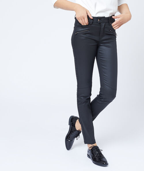 Jean slim enduit noir enduit.