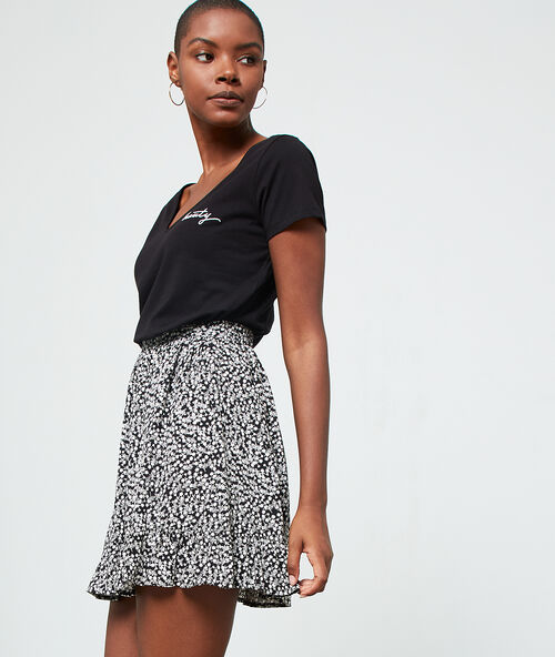 Flie&szlig;ender schlittschuh-rock schwarz.