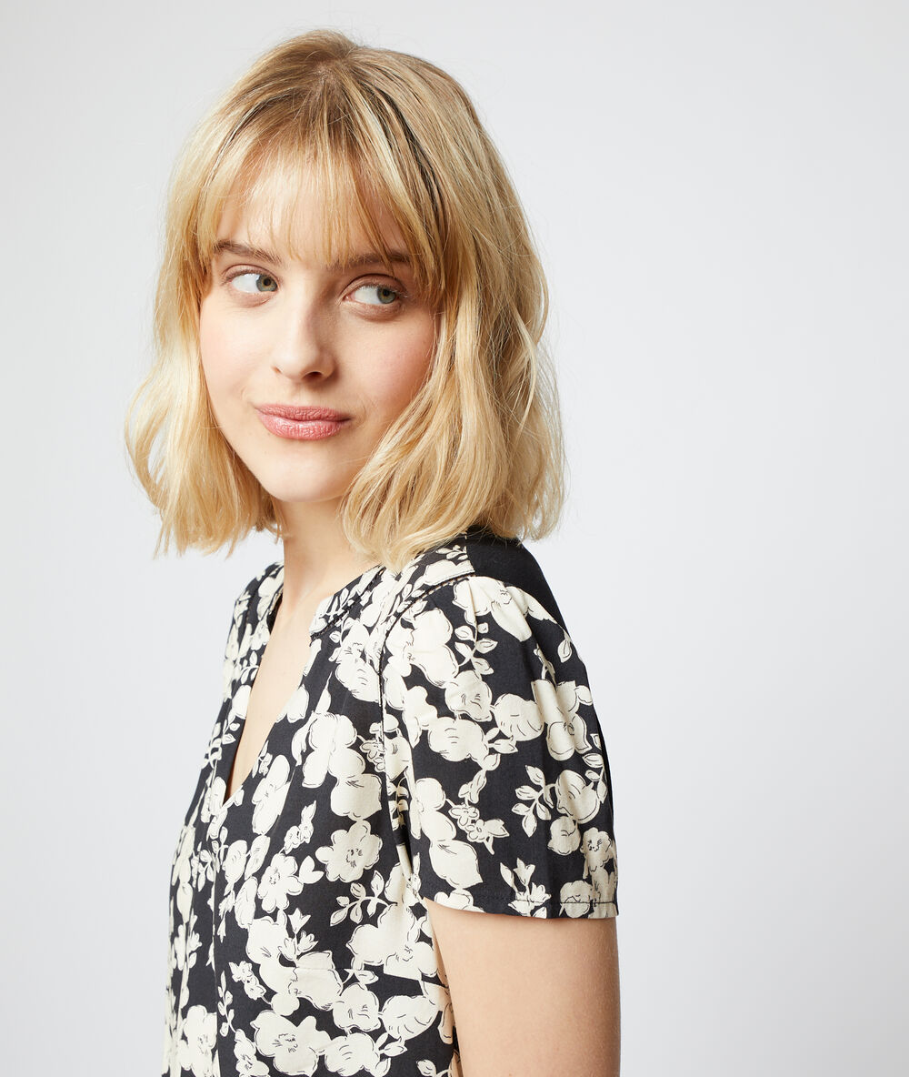 Top mit floralem print schwarz.