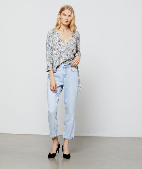 Blouse cache cœur à imprimé floral nude.