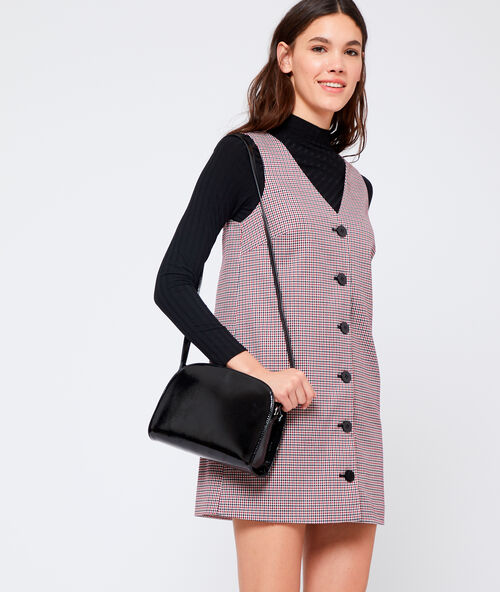 Sac besace effet vernis noir.