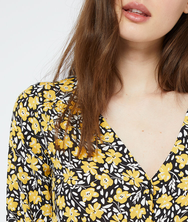 Blouse imprimé fleuri noir.